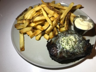 Marinated & Grilled prime flat iron Steak Frites with maitre d'hotel herb butter